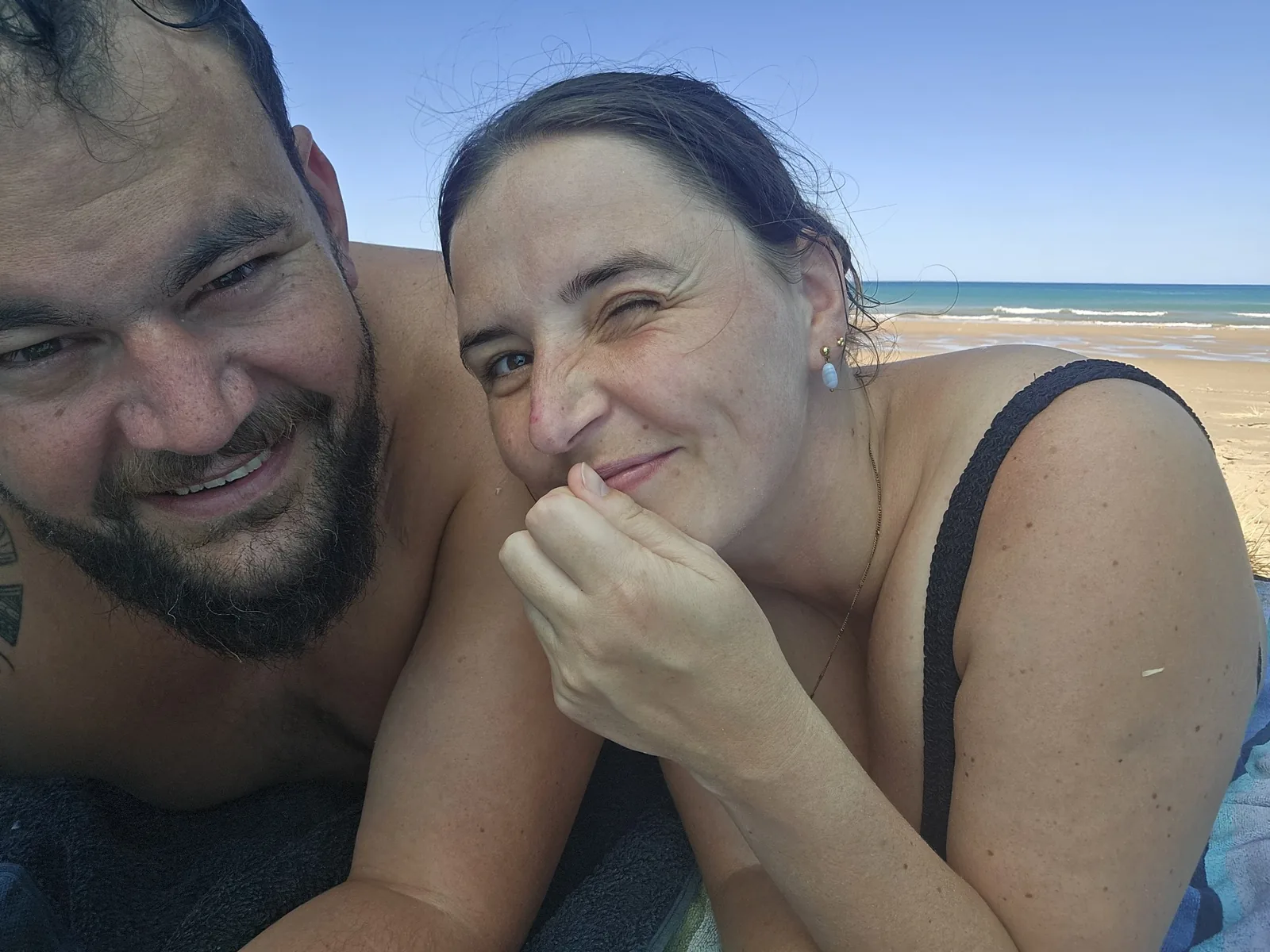 A playful beach moment together
